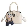 Bolso Elegante de Color Sólido con Textura en Forma de Concha para Mujer 2026 Nuevo Bolso de Hombro de Moda Bolso Cruzado Retro de Moda