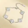 Conjunto de Joias de Aço Inoxidável Banhado a Ouro 18K, Trevo de Quatro Folhas, Colar, Pulseira e Brincos, Venda Quente Transfronteiriça, Atacado Direto da Fábrica