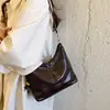 Bolso de mano retro transfronterizo para mujer, nueva colección otoño 2026, moderno y elegante, bolso de hombro versátil, estiloso y chic para el trabajo, bolso cruzado