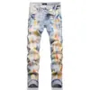 Jeans casuales para hombre de corte ajustado, estilo americano moderno, nuevos, con tinta en spray azul claro y efecto desgastado, para uso transfronterizo