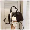 Versión coreana 2025 verano nuevo nicho moda color liso bolso de mano elegante bolso pequeño tipo almohada bolsa cuadrada pequeña