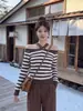 Otoño/Invierno Nuevo Suéter de Punto de Alta Gama con Cuello Halter Cruzado Hombros Descubiertos Manga Larga Estilo Coreano Bloque de Color Rayas Versátil para Mujer