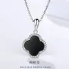 Collar de trébol de cuatro hojas para mujer, cadena de clavícula de nicho de lujo, elegante y simple, colgante combinable, joyería del mismo estilo.