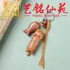 Pingente de orelha Yujian em escultura de madeira de jujuba, Pingente de bolsa Ruyi Pixiu moderno com borla de madeira trançada Yiming Xianyuan criativo