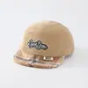 Al por mayor Otoño 2026 Lana Cálida Gorra de Pato para Bebé Estilo Coreano Serie a Cuadros para Niños y Niñas Sombrero de Ala Suave de Moda para Bebé