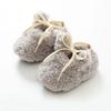 Zapatos de piso y calcetines para niños lana de cordero engrosados calcetines cálidos para bebé dispensación antideslizante calcetines para recién nacido clase A mayoreo