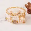 Pulseira Boêmia de venda quente transfronteiriça com pingente de cristal, quatro pulseiras de contas de vidro, elástica, joia de mão requintada
