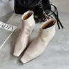 Botas altas largas hechas a mano en Guangzhou, estilo minimalista, de piel de becerro de primera capa, con elevación interior, puntera cuadrada, sin cordones, planas, de moda
