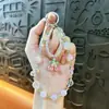 Cadena Creativa de Aleación con Cerezas de Doble Hilo y Cuentas para Teléfono Móvil Llavero Colgante Exquisito para Bolso Accesorios para Funda de Teléfono Móvil Pequeños Regalos