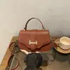 Bolso Cuadrado Pequeño Simple de Color Sólido Transfronterizo 2026 PU Nuevo Elegante Textura Retro para Viajar de un Solo Hombro Cruzado de Mano para Mujer
