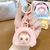 Llavero de gato caricatura creativa que hace sonido, guiña el ojo, colgante para bolso, juguete para aliviar el estrés, accesorio colgante para llavero, pequeño regalo