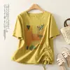 Camiseta informal versátil de tiro lateral para adelgazar, nuevo top de moda de verano de algodón y lino estampado de manga corta