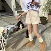Pantalones cortos de invierno de lana de cordero de alta gama para mujer de Dongdaemun, Corea