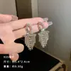 Exquisitos pendientes largos cortos con borlas incrustados de perlas y diamantes para mujer diseño de nicho de lujo ligero pendientes de lazo amor