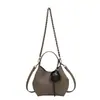 Bolsa Saco Design Nicho Retro Casual Feminina Outono 2026 Novo Estilo Moda Sensação de Alto Padrão Bolsa de Ombro Único Transversal