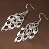Dz Pendientes de gancho con borla estilo europeo y americano, cola de pavo real, para mujer, aretes exagerados de personalidad de nicho calados, aretes de lujo ligero de alta gama de moda