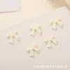 Jóias de unha de arco explosivo resina tridimensional pequeno arco diy decoração de unhas acessórios Joker atacado