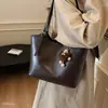 Nova bolsa casual da moda para mulheres, bolsa de ombro, tote, outono de 2026, retrô, super popular