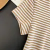 Venta al por mayor transfronteriza Ropa de mujer europea y americana Verano Nueva moda Simple Casual Cuello redondo Manga corta Corte ajustado Top 4744101