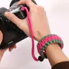 Pulsera trenzada de supervivencia para emergencias con cuerda para paraguas, pulsera trenzada para cámara digital, pulsera anticaída y antipérdida.