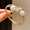 Pulsera minimalista de estilo coreano con estrella de circón y perla, una pieza de joyería única y exquisita, un accesorio ligero y moderno que complementa cualquier atuendo, disponible al por mayor
