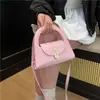 Bolso de nicho transfronterizo para mujer, nuevo bolso de hombro semi-redondo, versátil para el trabajo, bolso cruzado con hebilla de candado vintage, bolso de moda