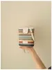 2026 Verano Nuevo Estilo Arcoíris Gran Capacidad de Moda Bloqueo de Color Moderno Elegante Bolso Cubo Tejido de Hombro Cruzado para Mujeres