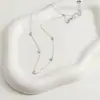 Pulsera Elegante de Moda Corazón Pequeño Circonita Azul y Blanca Acero de Titanio para Mujer Cadena Fina Exquisita Lujo Ligero Joyería de Mano Transfronteriza Corazón de Melocotón Cruz