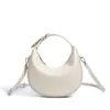 Bolsa Meia-Lua 2026 Estilo Coreano Design Clássico Bolsa de Mão Couro Bovino de Primeira Camada Nova Bolsa Transversal para Mulheres Nicho para o Dia a Dia High-End