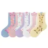 Meias transfronteiriças, sem costura, de algodão macio, hipoalergênicas, de comprimento médio para crianças, com design de gatinho pintado, cores vibrantes e estilo inspirado na dopamina, disponíveis para atacado e personalização.