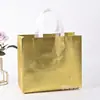Bolsa de tela no tejida con láser para compras, bolsa de regalo publicitaria, bolso de mano tridimensional termosellado ultrasónico en stock, logotipo impreso