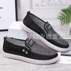 Una generación de nuevos zapatos de tela viejos de Beijing Moda Casual Zapatos de estudiante masculinos mocasines de lona vaquera de meter