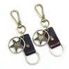 Decoración Creativa de Colgante de Estrella de Cinco Puntas de Aleación para Llavero de Coche de Hombre, Versátil Accesorio de Bolsa Estilo Retro Artístico