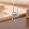 Yilu Plata S925 Plata Esterlina Jade de Agua Azul Hueco Candado Ruyi Superficie de Huevo Borde con Borla Zircón Súper Brillante Colgante de Arte