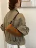 Bolsa pequena feminina transfronteiriça, bolsa tote de alta qualidade, bolsa de ombro, bolsa de ombro de nicho, bolsa transversal de luxo leve, bolsa de dumpling