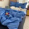 Juego de ropa de cama de algodón nórdico minimalista a rayas azul oscuro de cuatro piezas: funda de edredón de 1.8 m, sábana, sábana bajera, juego de ropa de cama de tres piezas