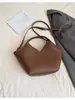 Bolso de Cubo de Mano Casual de Nicho para Mujer 2025 Invierno Nuevo Bolso de Hombro Cruzado de Alta Calidad para Viajes