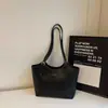 Bolso tote transfronterizo moderno y elegante para mujer, nueva colección otoño 2026, color liso, diseño simple, bolso de hombro y bolso de axila para el trabajo