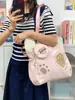 Bolsa de lona multi-color con estampado de pata de oso suave y linda, bolso de mano y bandolera de doble uso, bolsa escolar de gran capacidad para estudiantes