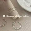Popular joyería de plata brillante de Dongdaemun, Corea del Sur: Anillo de plata de ley S925 hueco de luna y estrella, pequeño y lindo, adecuado para apilar