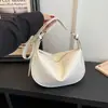Bolsas femininas transfronteiriças, bolsas retrô populares, novas bolsas de ombro texturizadas da moda para mulheres, bolsas crossbody vintage para o dia a dia, estilo bolinho