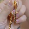 Aretes de Borla de Flores Dulces y Coloridas con Incrustaciones de Diamantes Super Brillantes al Estilo Coreano, Lujo Accesible y Aretes de Lazo Populares de Celebridad de Internet de Alta Gama