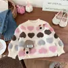 Nuevo y elegante suéter de punto otoño-invierno 2026 para niñas, con un diseño de corazón de dibujos animados, perfecto como capa base para los atuendos de otoño de las niñas