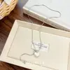Collar con colgante de corazón de plata con letra estilo Ins, gargantilla de titanio de alta gama, nicho, tipo retráctil, accesorio versátil para mujeres