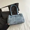 2026 Invierno Nueva Moda de Gran Capacidad Tendencia Diseño de Nicho Versátil Casual Simple Texturizado Bolso de Hombro