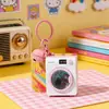 2026 Nova Mini Máquina de Lavar Original Chaveiro Luminoso Pequeno Presente Brinquedo Criativo para Alívio de Estresse Pingente de Mochila