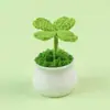 Planta de interior popular de trébol de cuatro hojas artificial, planta verde artificial tejida, artículo decorativo creativo de alto valor, regalo de la suerte, venta al por mayor desde el fabricante