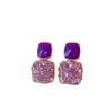 Elegantes aretes cuadrados morados para mujer, aretes de botón de nicho de lujo ligero, nuevo modelo popular 2026, aretes colgantes únicos y elegantes
