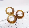 Colgante circular de resina amarilla estilo chino nuevo, pendientes de alta gama, accesorio para suéter
