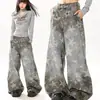 Jeans camuflados de pierna ancha estilo workwear de alta calle americanos con diseño de estampado de estrellas, corte recto holgado, estilo de pierna curva, unisex
